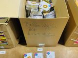 several boxes of mail are sitting on the floor next to each other