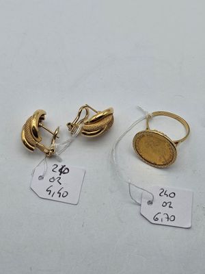 two pairs of gold earrings and a gold coin on a white surface