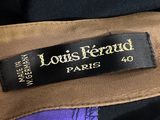 a close up of a label on a purple and black suit