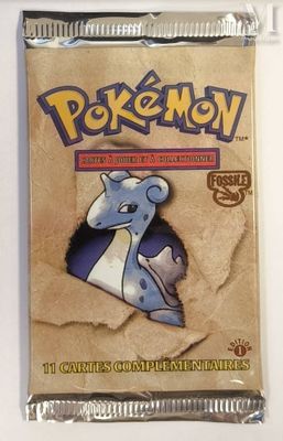a close up of a bag of pokemon trading cards on a table