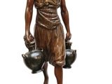bronze statue of a man holding two pots and a bowl