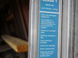 a close up of a glass door with a sign on it