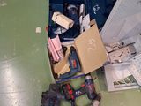 a pile of tools on the floor in a room
