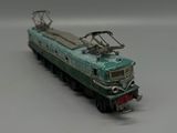 a toy train that is sitting on a white surface