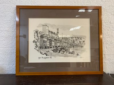 dessin encadré représentant une vue de ville avec une tour horloge en arrière-plan