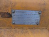 a close up of a metal plate on the back of a bulldozer