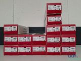a pile of red boxes stacked on top of each other