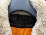 a close up of a jacket with a hat on it