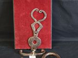 an image of a pair of scissors sitting on top of a red box
