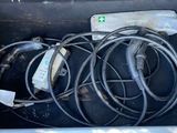 wires in the trunk of a car that is full of wires