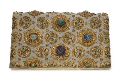 an image of a gold and blue clutch bag with stones on it
