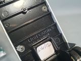 a close up of a cell phone that is on a table