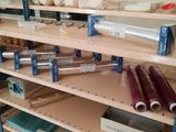 a shelf that has many different types of tools on it