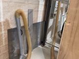 a hose that is attached to a wall in a room