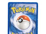 a close up of a pokemon news card on a white surface