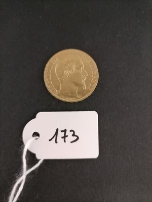 a close up of a coin with a price tag attached to it