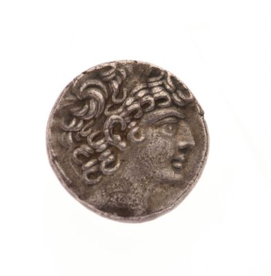 une image représentant une pièce de monnaie sur laquelle figure le portrait d'une femme