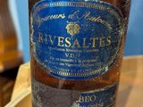 a bottle of wine that is sitting on a table