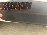 someone is holding a measuring tape with the word vauto on it