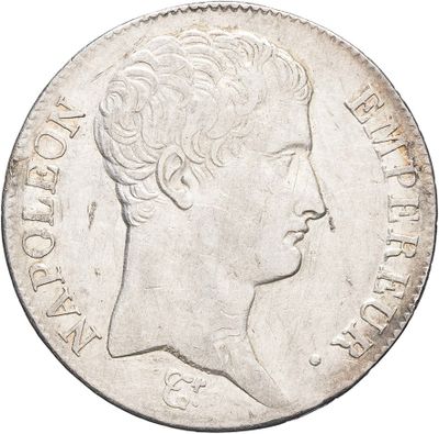 a close up of a coin with a woman ' s face on it