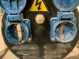 an image of a parking meter with a blue cover