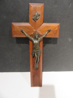 wooden crucifix with jesus on the cross on a stand