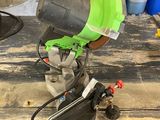 someone is using a circular saw to cut a piece of wood