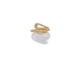 a close up of a gold snake ring on a white surface