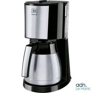 the coffee maker is on a white background with a black handle