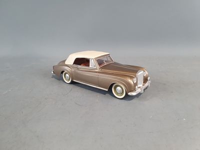 a toy car that is sitting on the floor