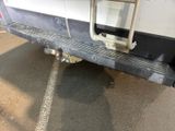 an image of a truck with a dog door on the back of it