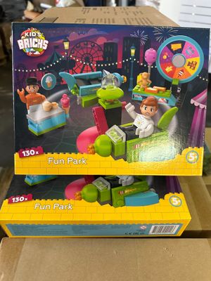 two boxes of toys are stacked on top of each other on a table