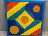 tableau représentant une peinture abstraite colorée composée de cercles et de carrés sur un fond blanc