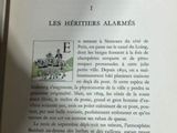 an open book with a picture of a horse drawn carriage on it