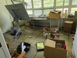 a room with a lot of boxes and boxes on the floor