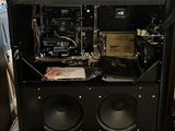an image of a computer with speakers and a monitor