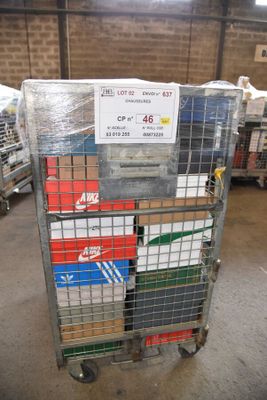 a cart with a lot of boxes on it in a warehouse