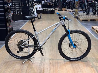 a bike that is sitting on the floor in a store
