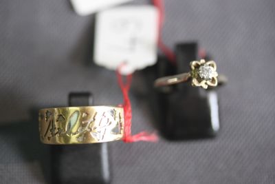 two rings that are sitting on top of each other