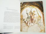 an open book with a picture of a man and a woman on it