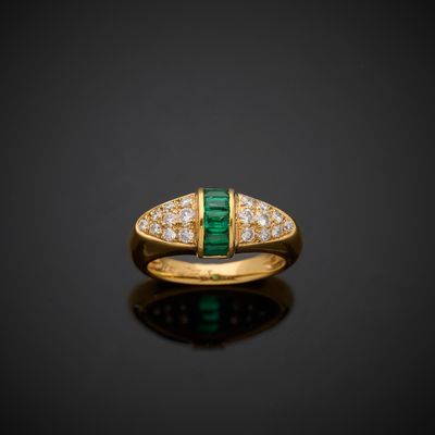 an emerald and diamond ring