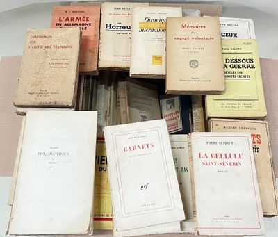 a lot of old books on a table together
