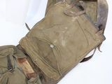 a bag with a bunch of items inside of it