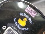 a close up of a mirror with a rubber duck on it