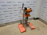 an image of a drill on a stand in front of a wall