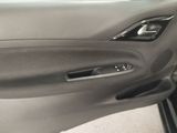 the door handle of a car is open and the door handle is closed