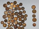 a lot of coins that are on the table