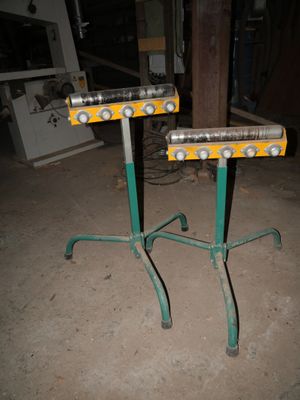 two tables that have lights on them in a room
