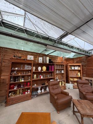 a room with a lot of furniture inside of it