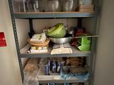 a shelf full of food and containers in a kitchen